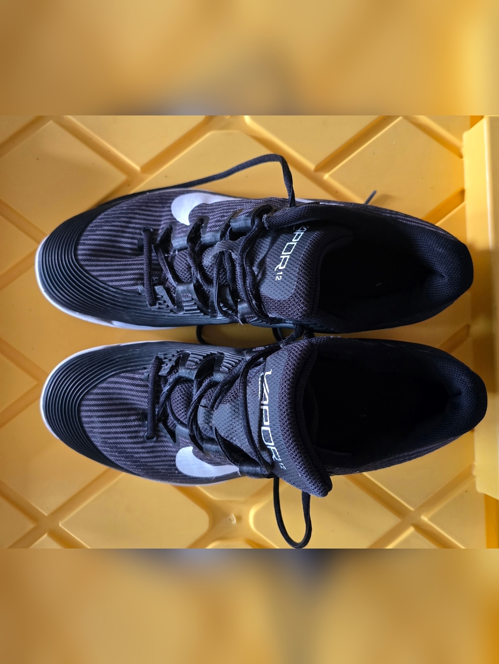 Nike Black and White Vapor 12 Athletic Sneakers